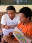 Oscar (left) with a member of the youth movement